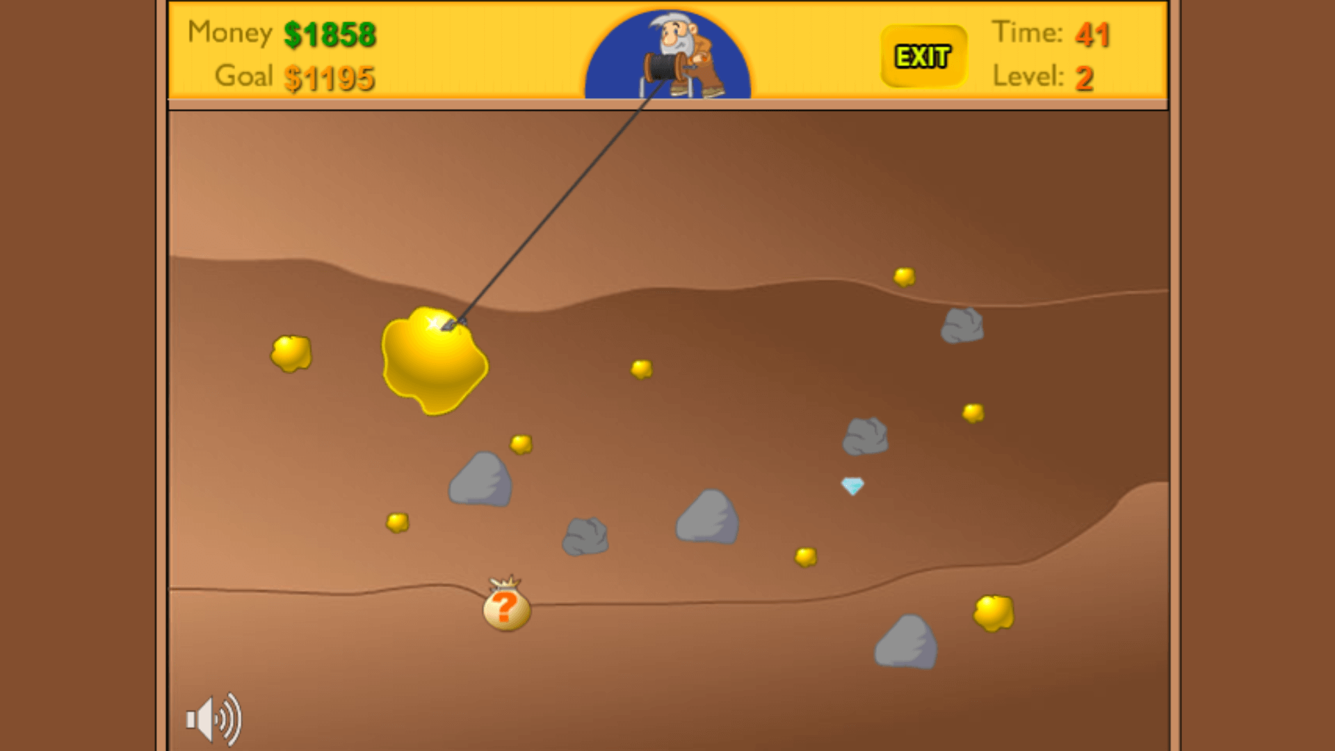 Player accidentally grabbing a rock obstacle that slows progress in Gold Miner