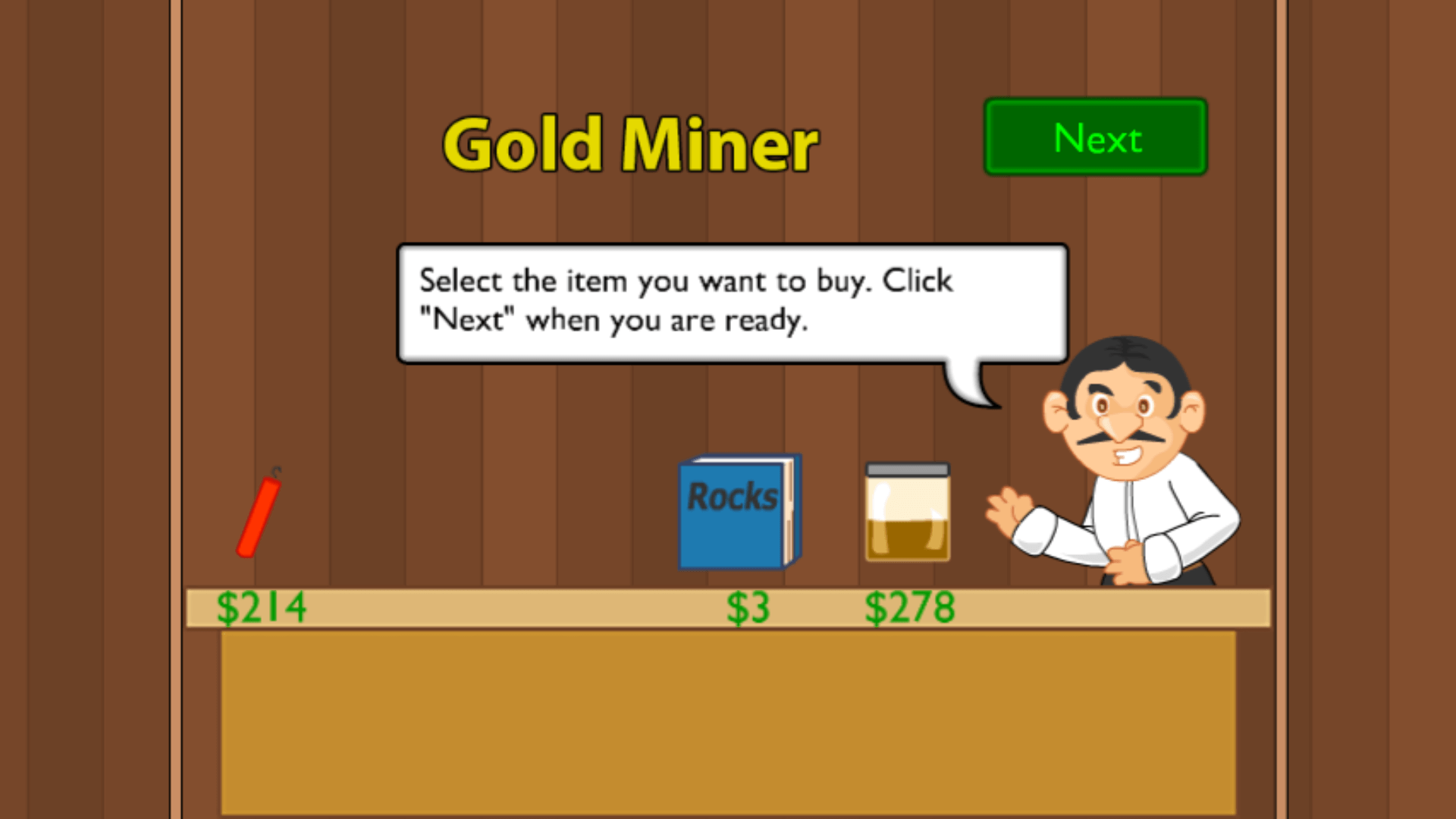 Gold Miner player using a bomb power-up to destroy rocks blocking valuable items