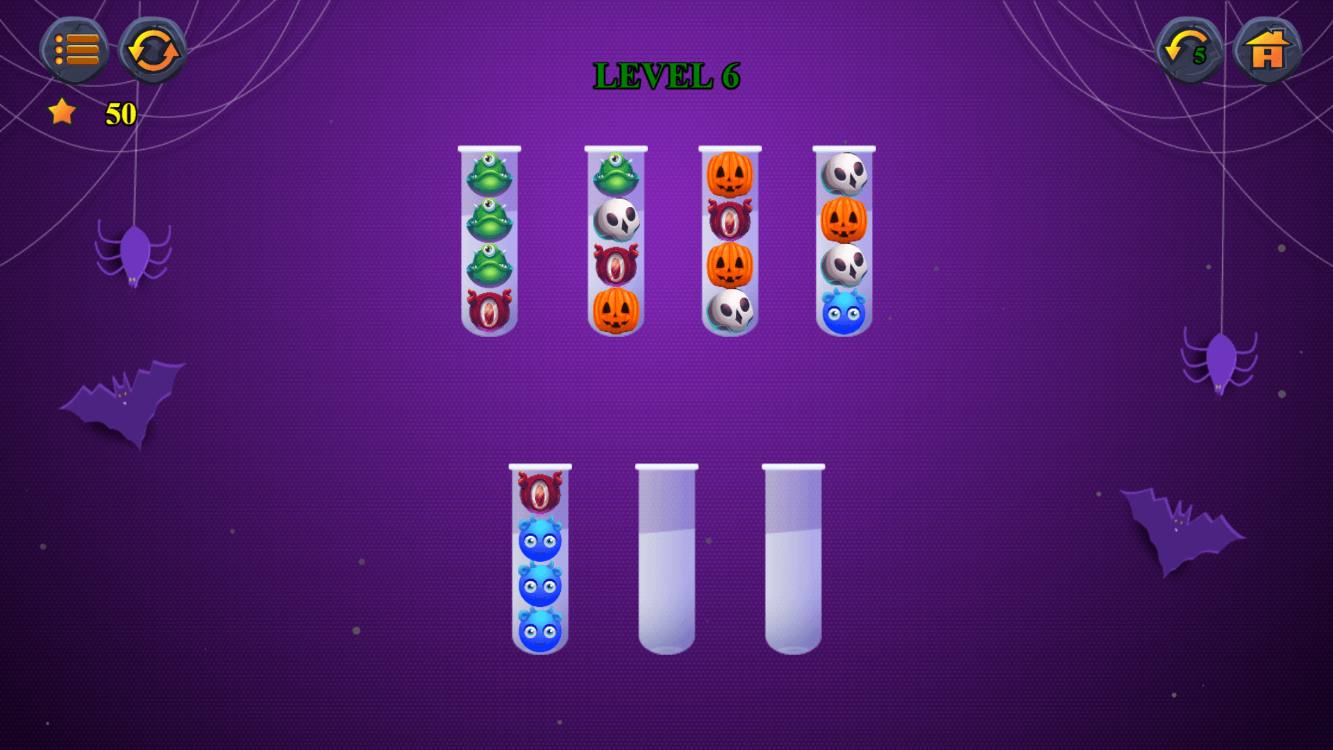 Monster balls being sorted into tubes in Ball Sort Halloween puzzle game