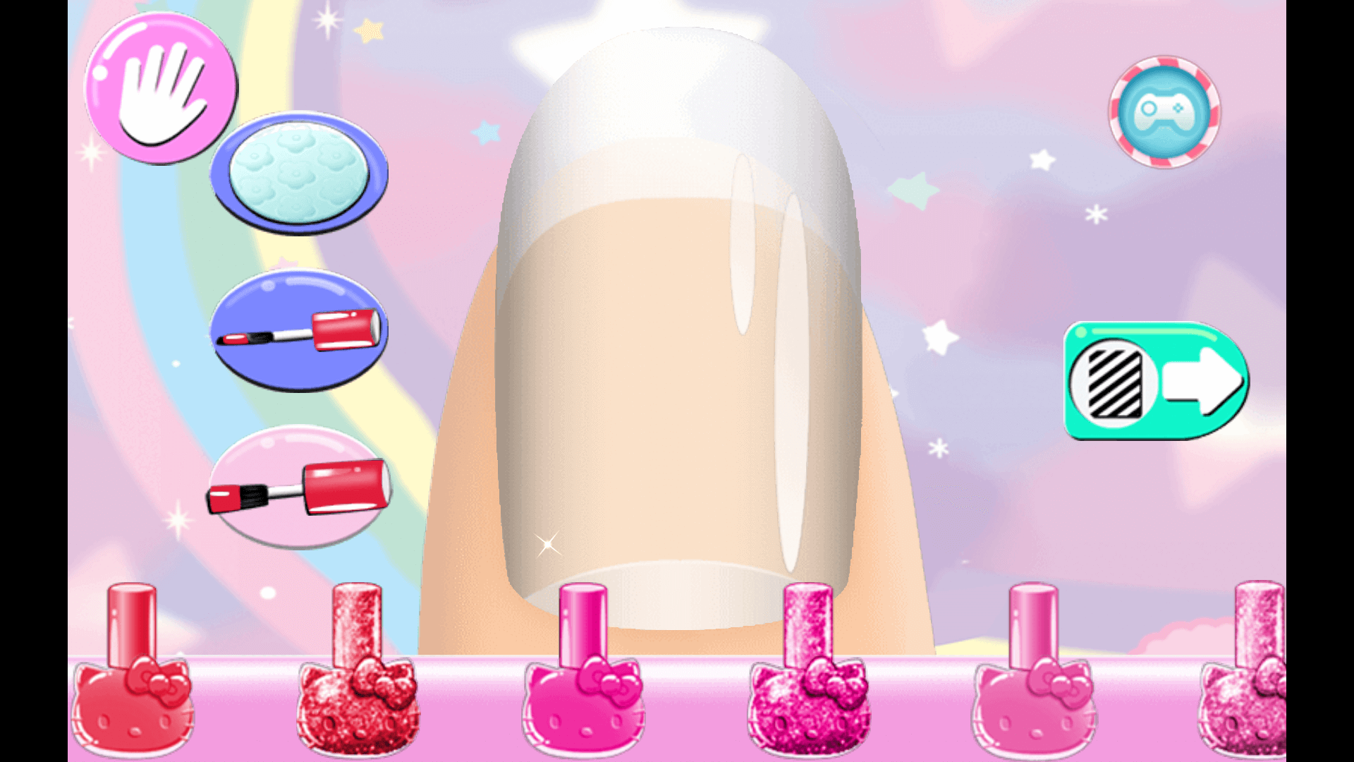Final nail design with gems, bows, and Hello Kitty details